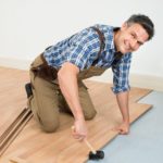 2049d564 8c18b3d1 cropped 7eda8c61 canva man installing new laminated wooden floor