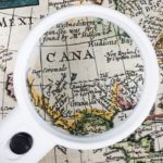72d25d01 5ff1a064 cropped d7ae3955 person holding magnifying glass map 23 2147837076